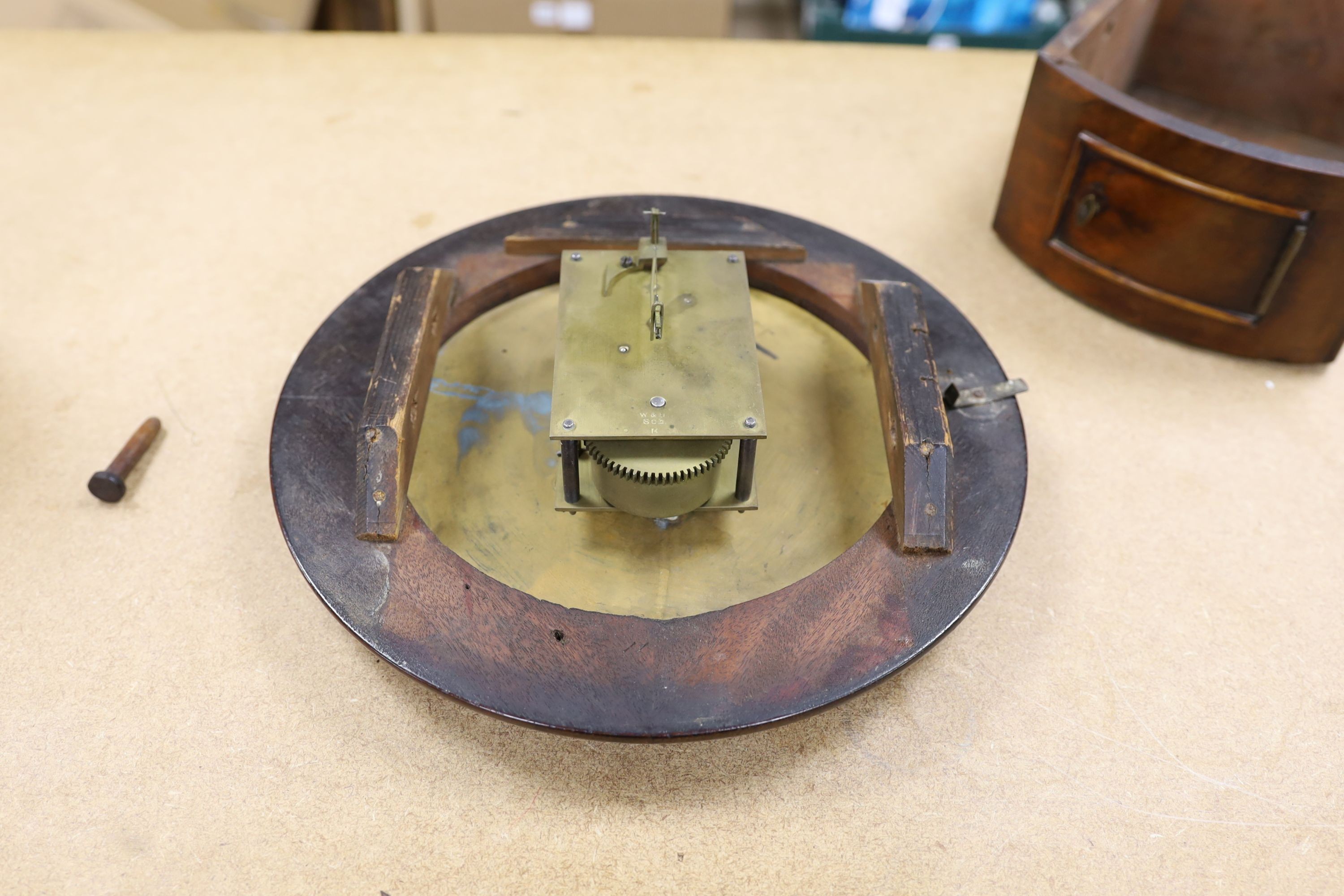 A Camera Kuss & Co. mahogany dial clock, 30 cms diameter.